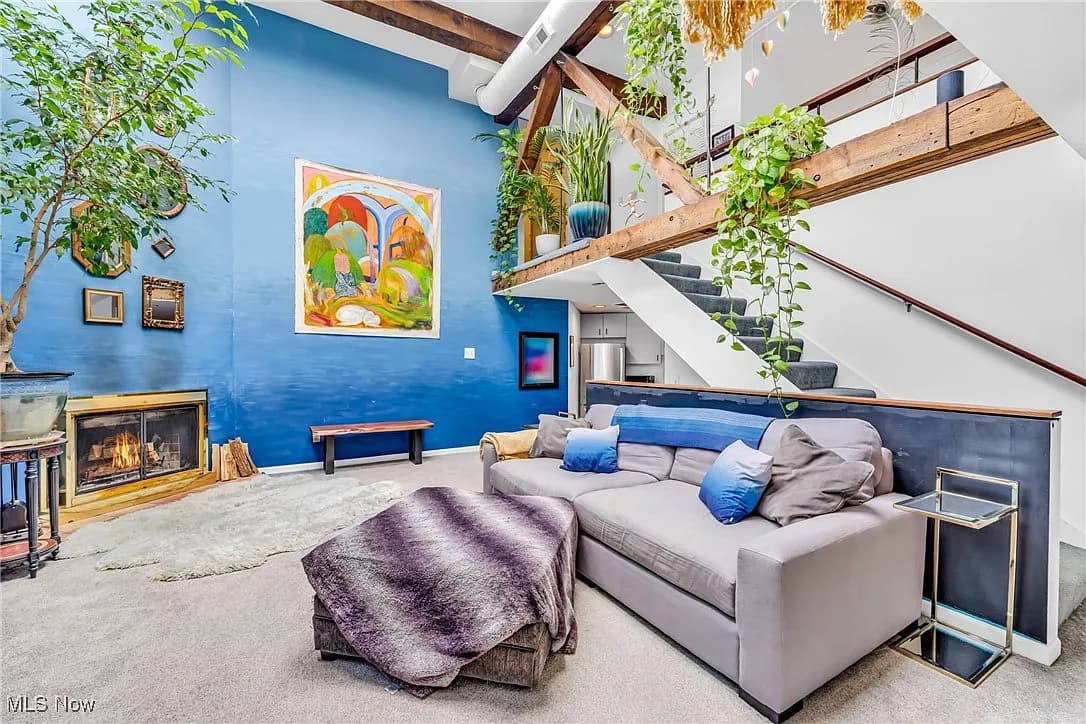 Sunlit living space with original architectural details at Lemko Hall